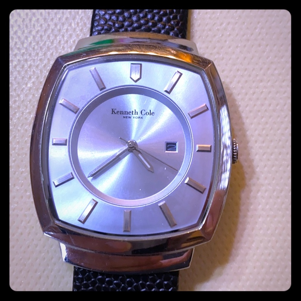 Kenneth Cole thin watch, with blue face black band